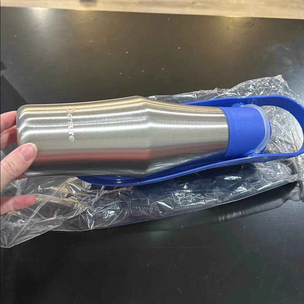 Silver and blue Dog Water Bottle on the go